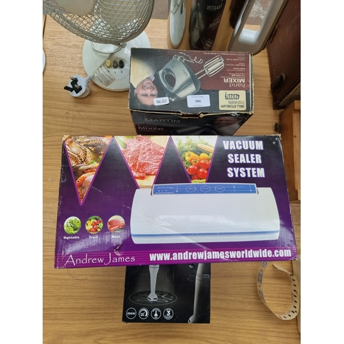 784 - Six items to include Tefal Easy Soup BL84 soup maker, boxed James Martin hand mixer, boxed Andrew Ja... 