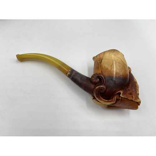 1367 - Two antique carved Meerschaum smoking pipes with leather cases