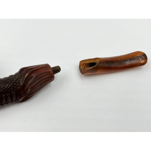 1367 - Two antique carved Meerschaum smoking pipes with leather cases