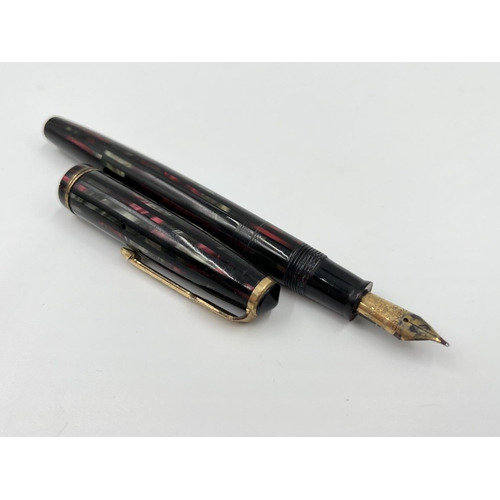 1385 - Four fountain pens, three Parkers - two with 14ct gold nibs and one Dickinson product 'The Croxley' ... 