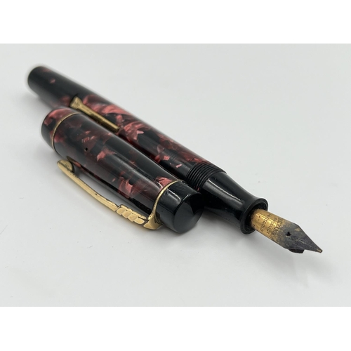 1385 - Four fountain pens, three Parkers - two with 14ct gold nibs and one Dickinson product 'The Croxley' ... 