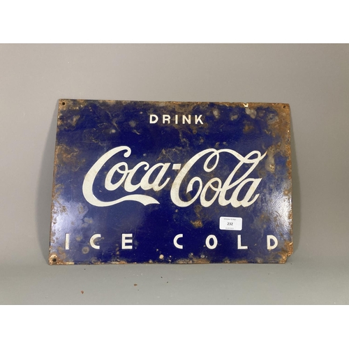 232 - A Coca-Cola enamel sign - approx. 41cm wide x 28cm high