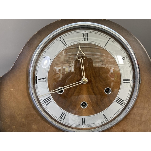 257 - A mid 20th century The Alexander Clark Co Ltd walnut cased mantel clock with key, pendulum and prese... 