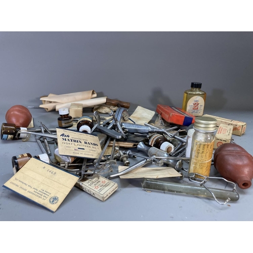 266 - A collection of early/mid 20th century dental equipment and accessories to include burs, matrix band... 