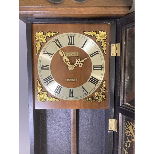 268 - Two mahogany cased wall clocks, one being President Quartz