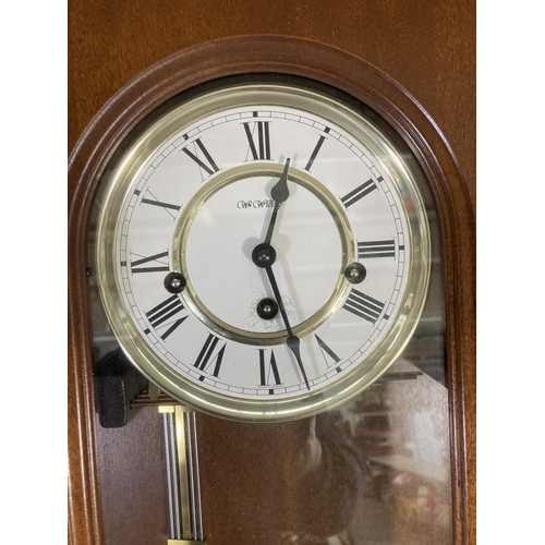 268 - Two mahogany cased wall clocks, one being President Quartz