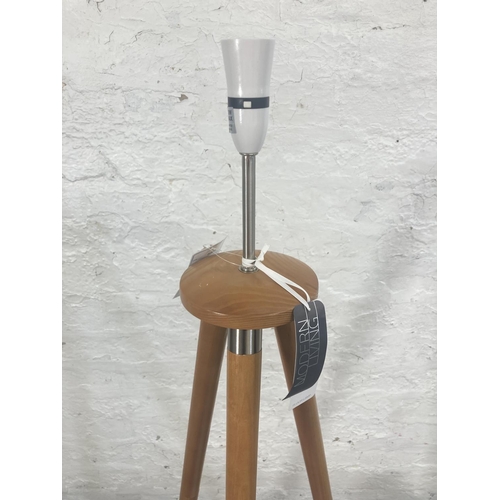 330 - A Modern Living Flossie tripod floor lamp with grey circular shade, RRP. £180 - approx. 137cm high