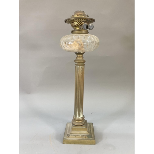 115 - Two late 19th/early 20th century oil lamps, one Young's Duplex brass Corinthian with glass reservoir... 