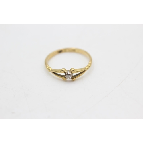 1075 - An 18ct gold diamond solitaire ring, size K - approx. gross weight 1.6 grams