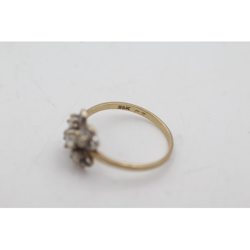 1076 - A 9ct gold clear gemstone floral ring, size N½ - approx. gross weight 1.5 grams