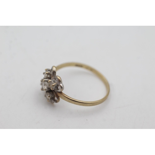 1076 - A 9ct gold clear gemstone floral ring, size N½ - approx. gross weight 1.5 grams