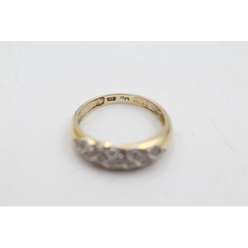 1080 - A 9ct gold diamond cluster ring, size L - approx. gross weight 1.7 grams