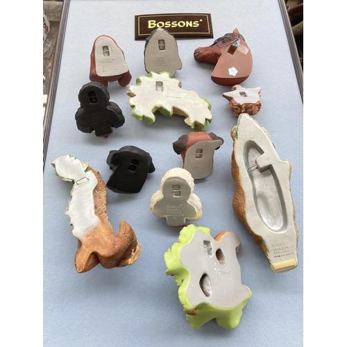 190 - Twelve Bossons animal wall plaques to include Basset Hound, Cocker Spaniel, Poodle, Raccoon, Squirre... 