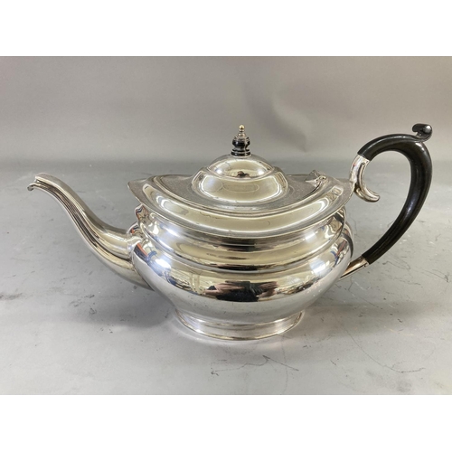 219 - Four pieces of silver plated ware, T.W & S three piece coffee/tea set and Civic milk jug