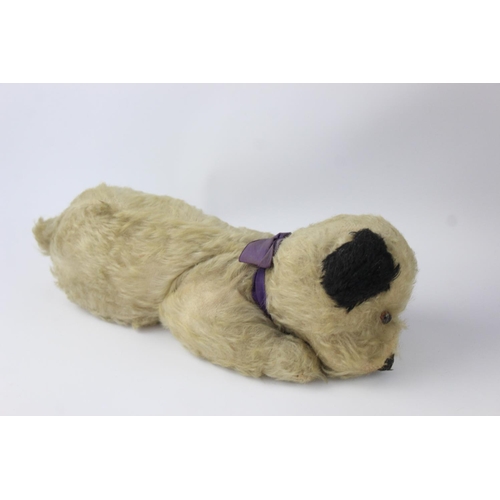 235 - Five assorted vintage dog soft toys and pyjama cases to include Wendy Boston etc.