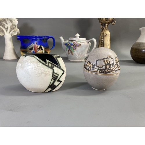 163 - A collection of studio pottery to include 1970s Gretel Shapiro 18cm jug, Carol Daw 9cm vase, Poole P... 