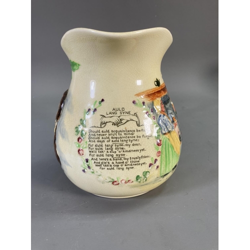 166 - Three ceramic musical jugs, one Crown Devon Fieldings  Auld Lang Syne, one Crown Devon Fieldings On ... 