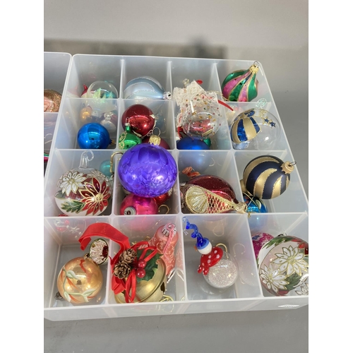 179 - A collection of various decorative Christmas baubles to include hand painted glass, Murano style sno... 