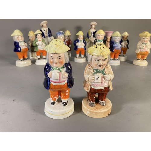 180 - Fifteen 19th century Staffordshire Pottery figures and character cruets