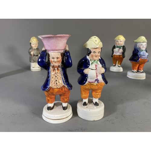 180 - Fifteen 19th century Staffordshire Pottery figures and character cruets