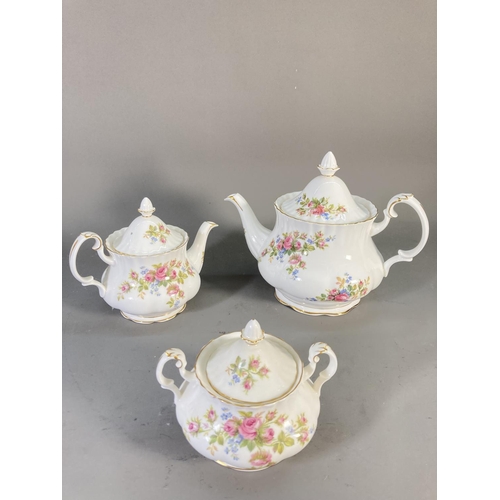 181 - A collection of Royal Albert Moss Rose china to include teapot, coffee pot, miniature teapot, twelve... 