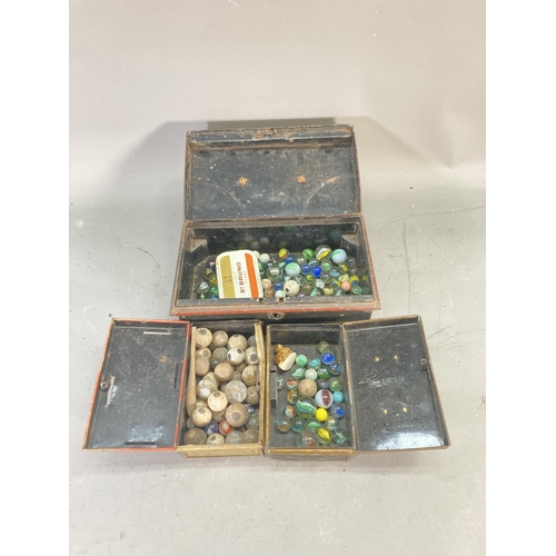 254 - A collection of antique and vintage marbles