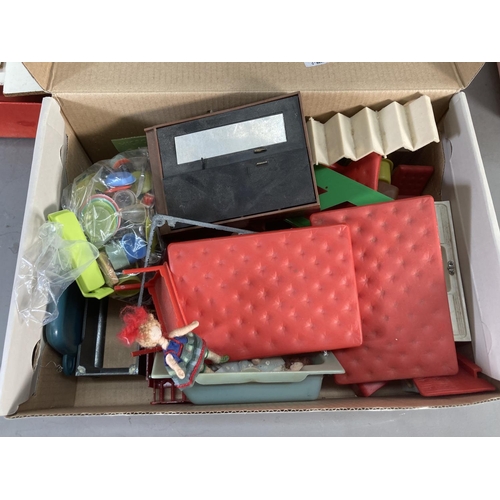 256 - A boxed vintage Winfield Packaway doll's house with garage with further doll's house accessories