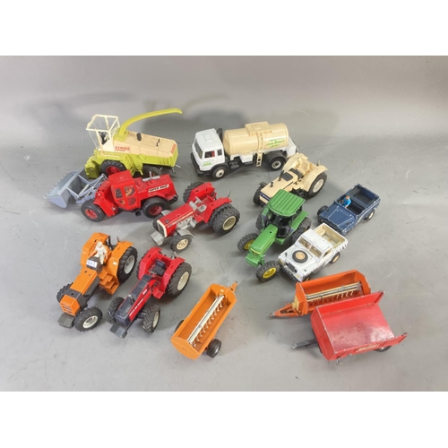 260A - A collection of 1980s Britain's model farm vehicles to include John Deere tractor, Landrover Defende... 