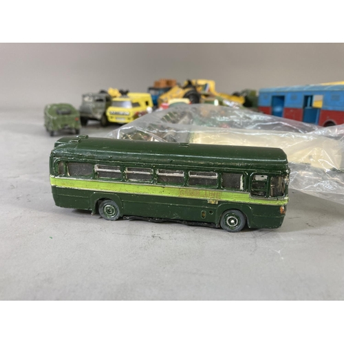 260D - A collection of assorted vintage diecast model vehicles to include Dinky tank transporter, Matchbox ... 