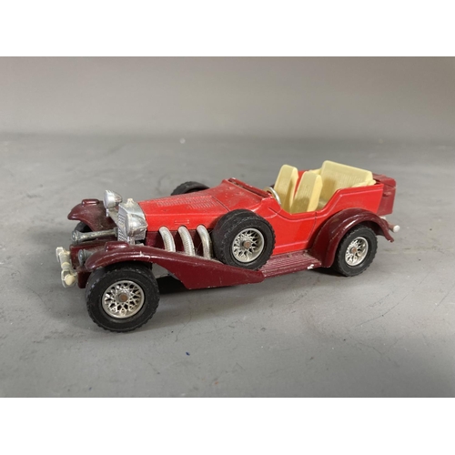 260D - A collection of assorted vintage diecast model vehicles to include Dinky tank transporter, Matchbox ... 