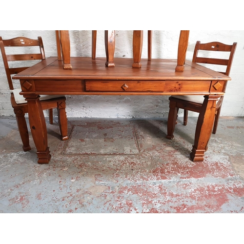 86 - A modern pine rectangular dining table and six matching dining chairs - approx. 77cm high x 90cm wid... 