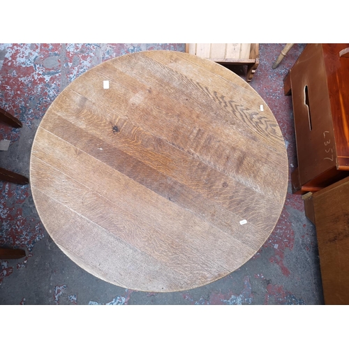 101 - A modern solid oak circular tripod pedestal coffee table - approx. 45cm high x 99 diameter