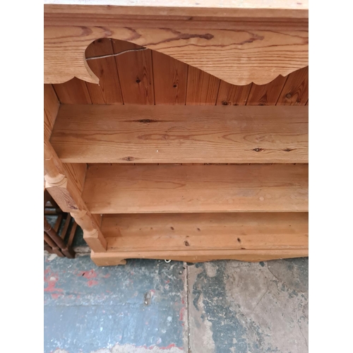 113 - A modern solid pine three tier open bookcase - approx. 116cm high x 126cm wide x 28cm deep