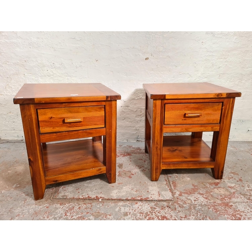 118 - A pair of modern stained pine two tier side tables, each having one drawer - approx. 60cm high x 53c... 