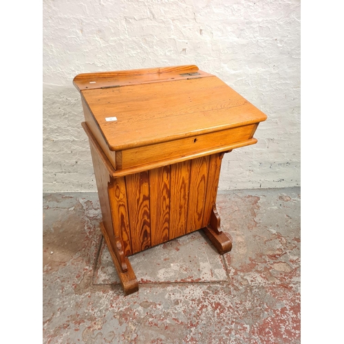 23 - A Victorian pitch pine headmaster's desk - approx. 97cm high x 66cm wide x 55cm deep