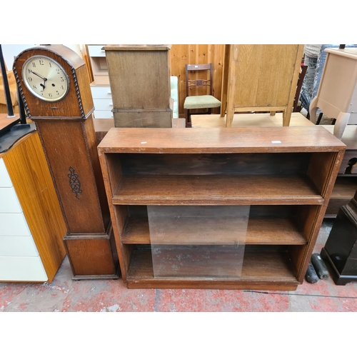 60 - Two items, one mid 20th century oak three tier bookcase with glass sliding door and one early 20th c... 