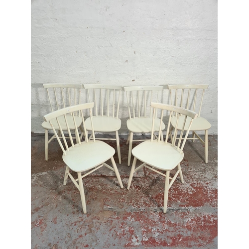 70 - A set of six mid 20th century Ercol style white painted spindle back dining chairs