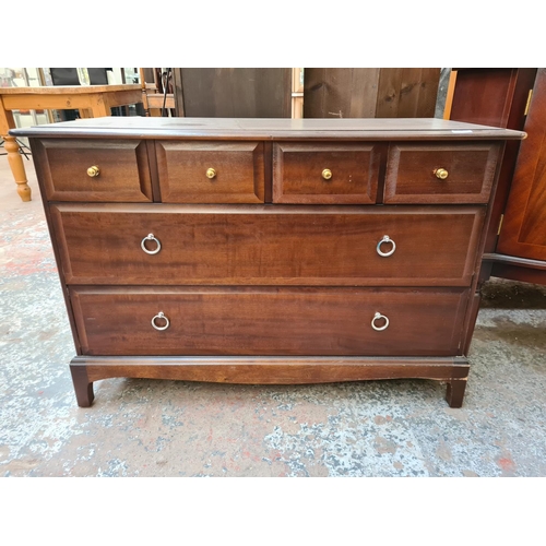 72 - A Stag Minstrel mahogany chest of four short over two long drawers - approx. 72cm high x 106cm wide ... 