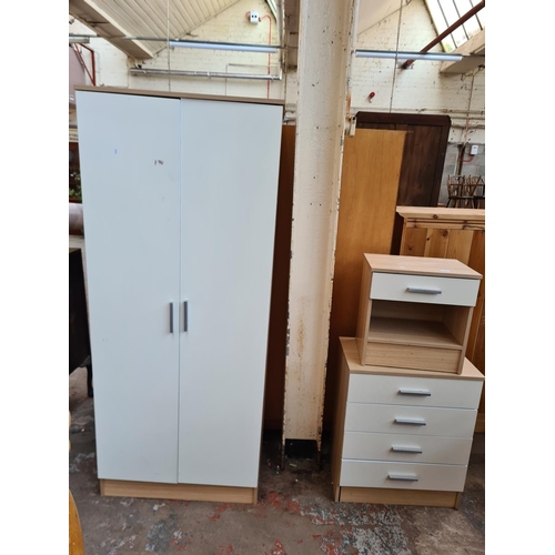 78 - A modern oak effect and white laminate three piece bedroom suite comprising double wardrobe - approx... 