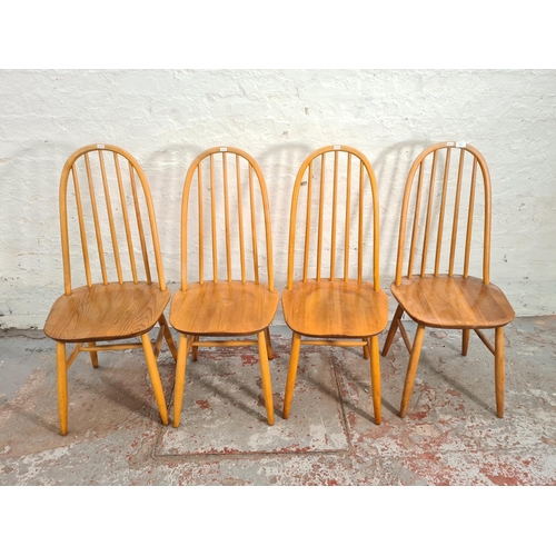 85 - A set of four Ercol style blonde elm and beech dining chairs