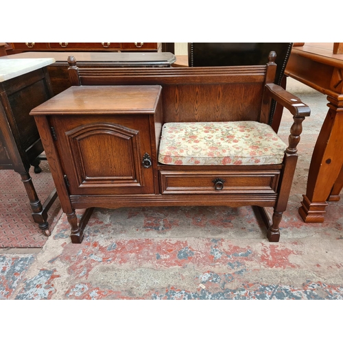 87 - A Jaycee oak telephone table/seat - approx. 78cm high x 99cm wide x 44cm deep
