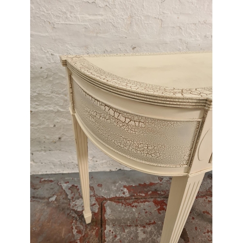 90 - A modern French style white painted console table with single drawer and tapering supports - approx.... 