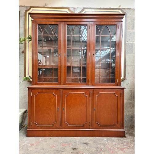122 - A Georgian style mahogany display cabinet with three upper glazed doors and three lower cupboard doo... 