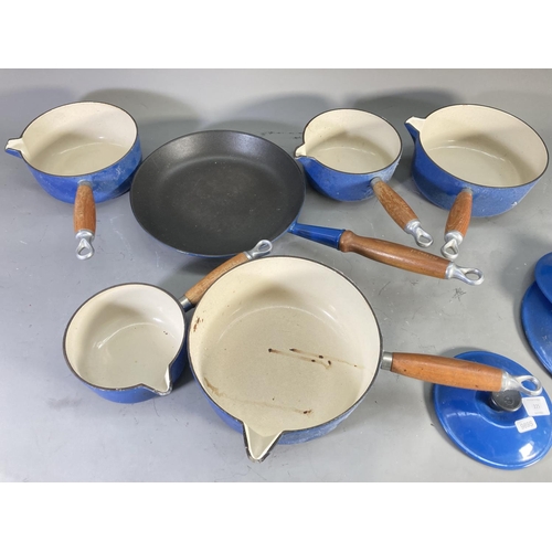 225 - Six pieces of Le Creuset blue enamel and cast iron cookware, five graduated saucepans (No. range 14-... 