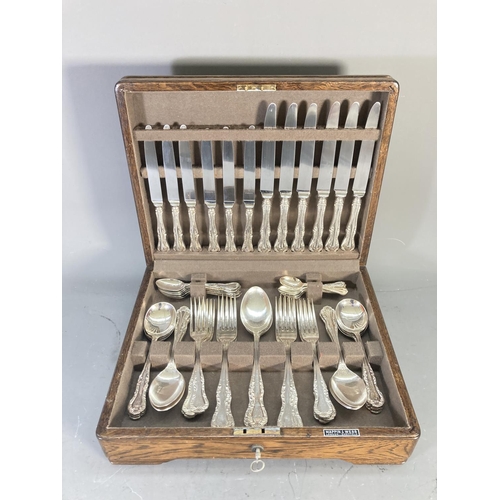 227 - A Mappin & Webb oak cased 51 piece canteen of cutlery