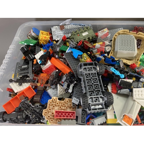 232 - A large collection of Lego to include figurines, building blocks, Coast Guard boat etc.