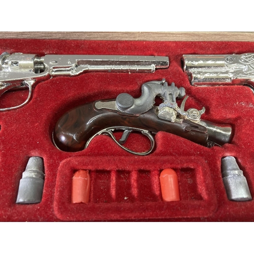 248 - A boxed BCM Outlaw Miniature Antique Firearms cap gun set