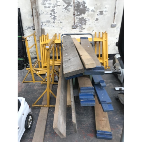 674A - A metal quick form scaffold tower set comprising feet, two tubs of scaffolding clips, scaffold board... 