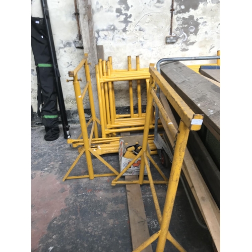 674A - A metal quick form scaffold tower set comprising feet, two tubs of scaffolding clips, scaffold board... 