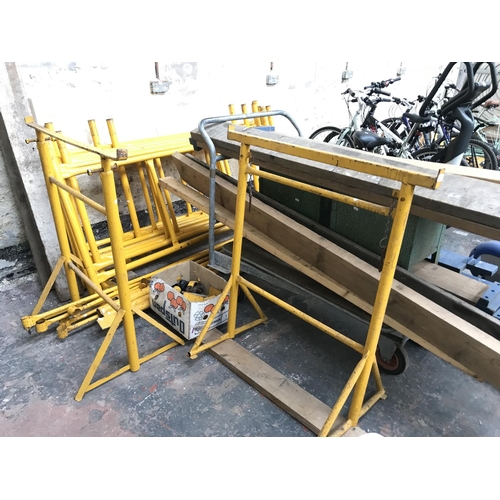 674A - A metal quick form scaffold tower set comprising feet, two tubs of scaffolding clips, scaffold board... 